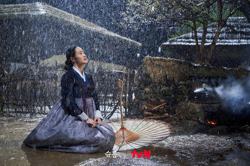under the queen's umbrella