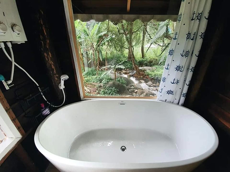 บ้านธารกล่อม &The River Whisper