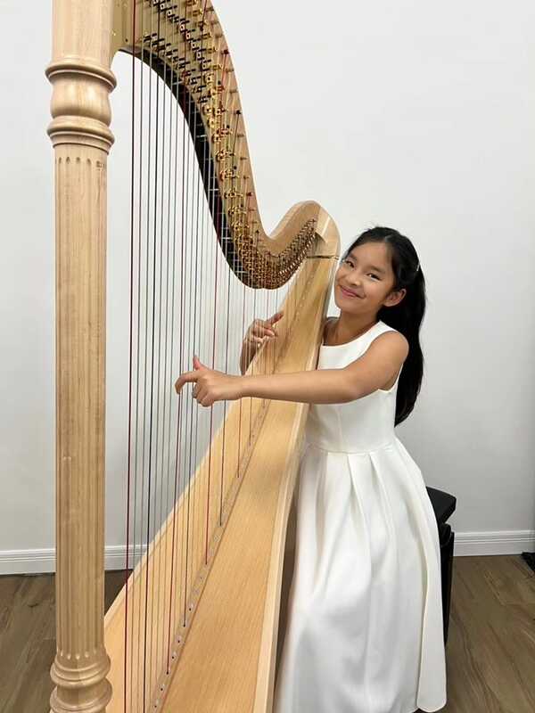 น้องปีใหม่ แข่งฮาร์ปชนะเหรียญทอง