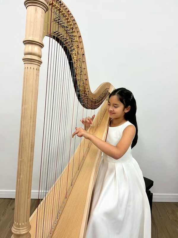 น้องปีใหม่ แข่งฮาร์ปชนะเหรียญทอง